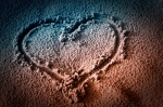 Heart in sand.